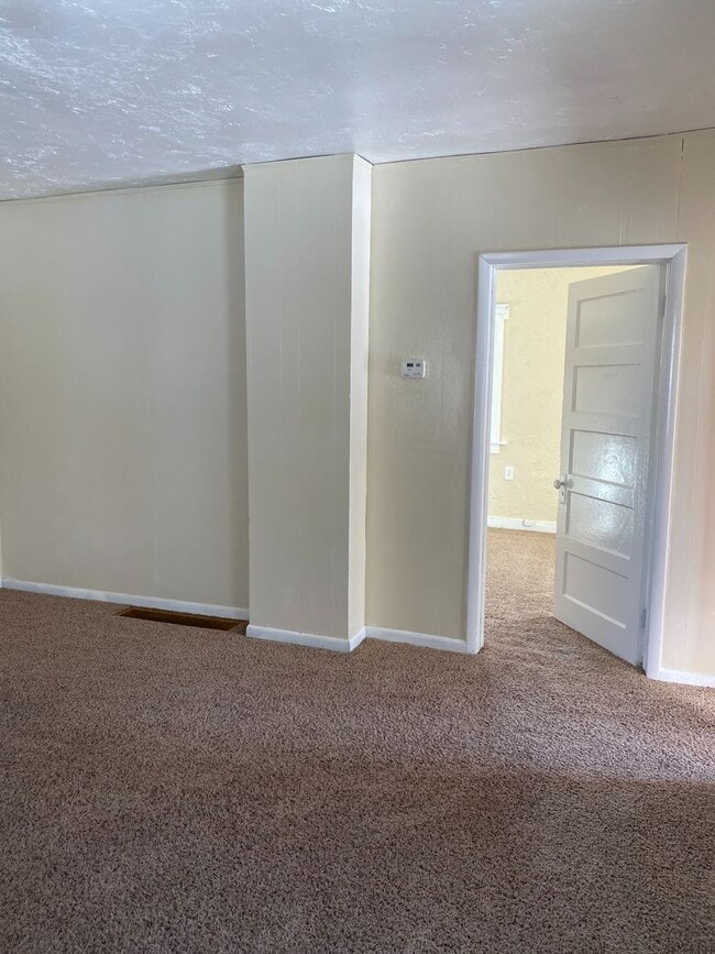 Building Photo - Cozy 2-Bedroom Home with Spacious Yard – C...