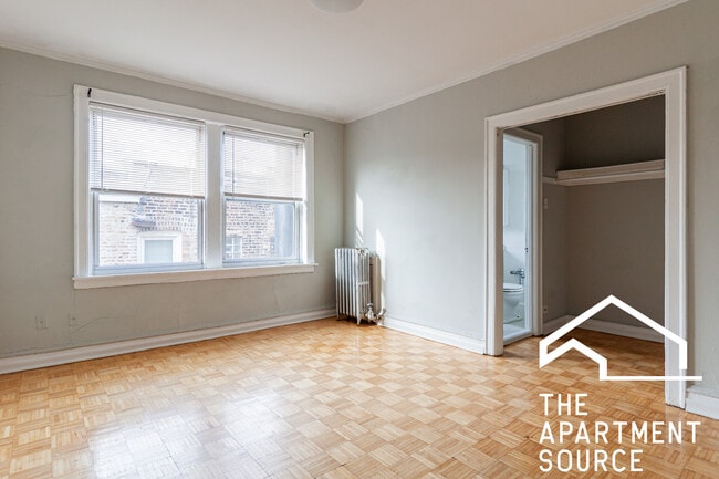 Building Photo - 717 W Belmont Ave