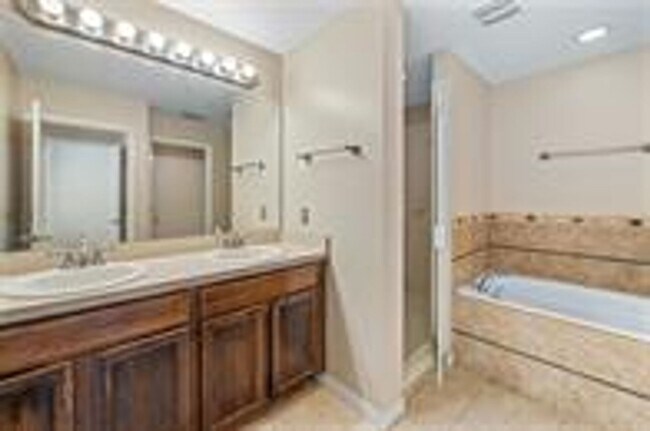 Building Photo - Luxury Lake Nona Townhome in Gated Community | 3BR + Garage + Resort-Style Amenities