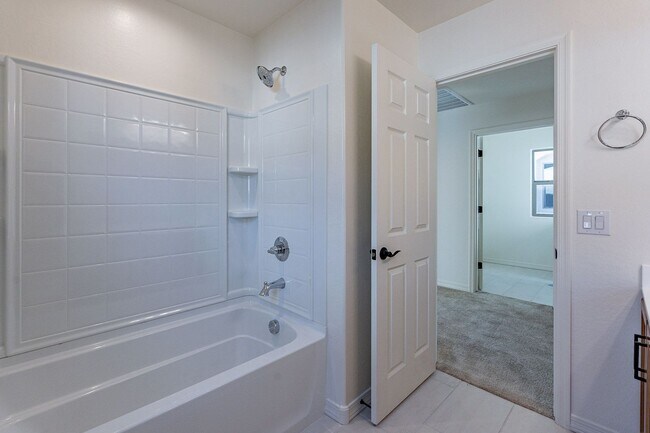 Building Photo - Three Bedrooms! Newer Neighborhood - conve...
