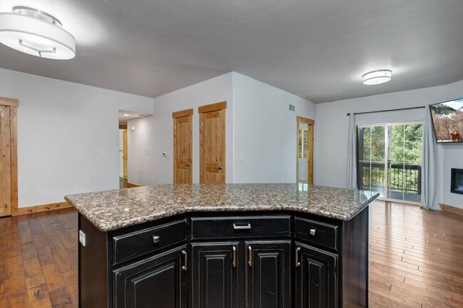 Building Photo - Unfurnished Condo Retreat with Modern Comf...
