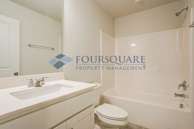 Building Photo - Three Story Town Home | Entry Level Bedroo...