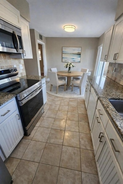 Building Photo - 12909 83rd Ave N