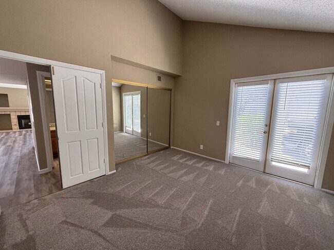 Building Photo - TWO BEDROOM TOWNHOME IN THE LAKES WITH GARAGE AND ATTACHED CARPORT
