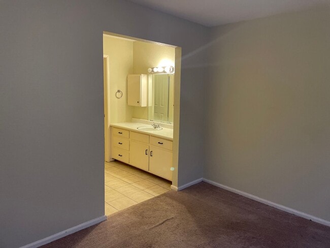 Building Photo - 2 bedroom duplex!  2 bath, 2 car carport