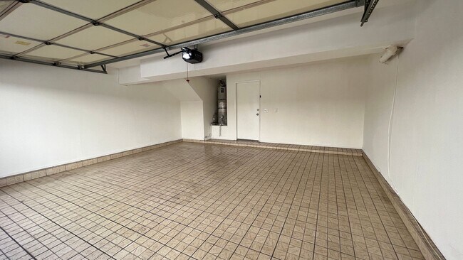 Building Photo - Freshly Updated 2-Bedroom Condo with Attached Garage in Gated Winnetka Community