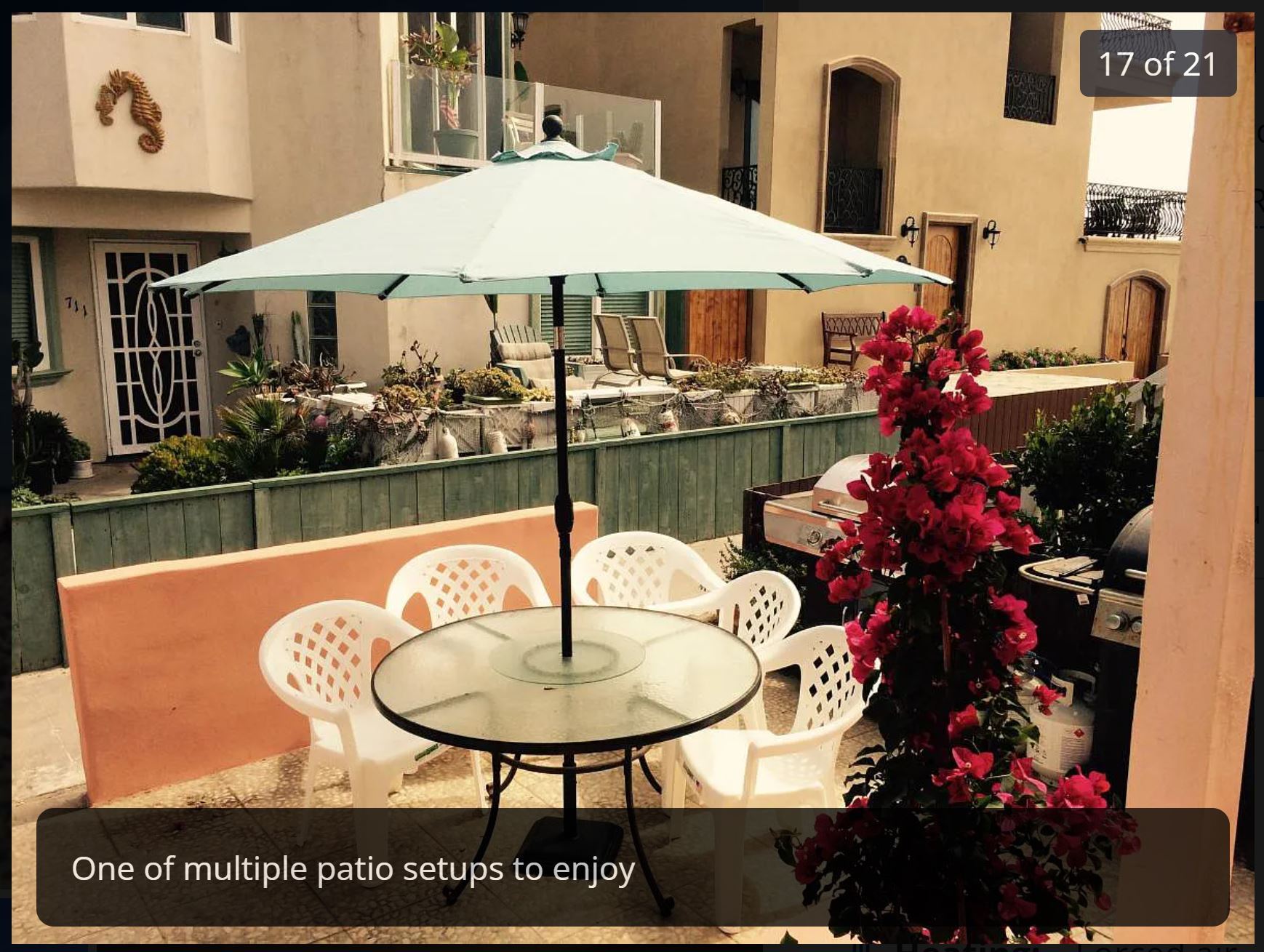 Portion of shared patio with hot tub, BBQs, tables, etc - 3990 Strandway