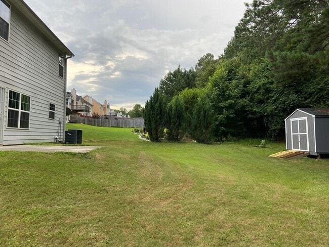 Building Photo - 4BR Home w/ Fireplace + 2-Car Garage in Snellville