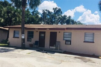 Building Photo - Central Sarasota unit, convenient to popul...