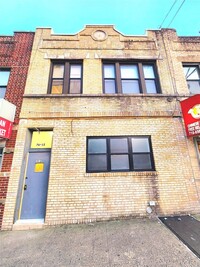 Building Photo - 76-12 Woodside Ave