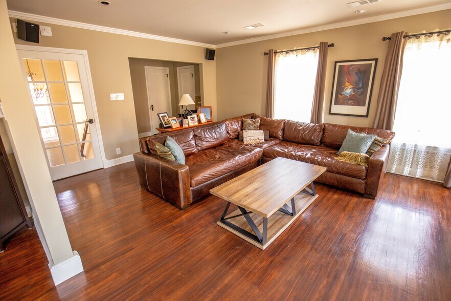 Semi-private workspace and bonus room off of living room. - 1327 S Sycamore Ave