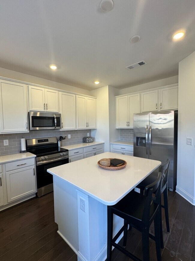 Building Photo - Fully Furnished 4BR Home with Loft, Patio & 2-Car Garage – Lawn Care Included