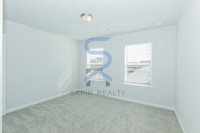 Building Photo - Move in before February 28th and choose your reward: a $250 Amazon Gift Card or a 55" Smart TV!