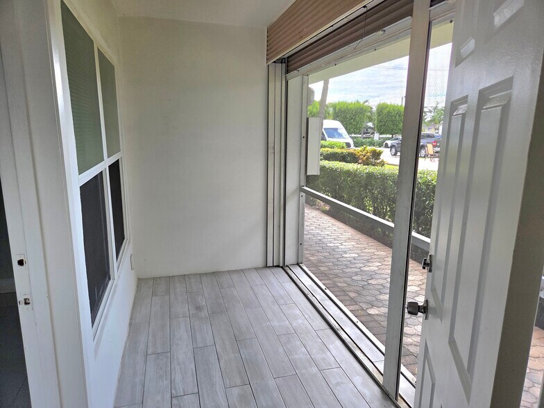 Screened Porch with a Garden View - 1971 SE 5th Ct