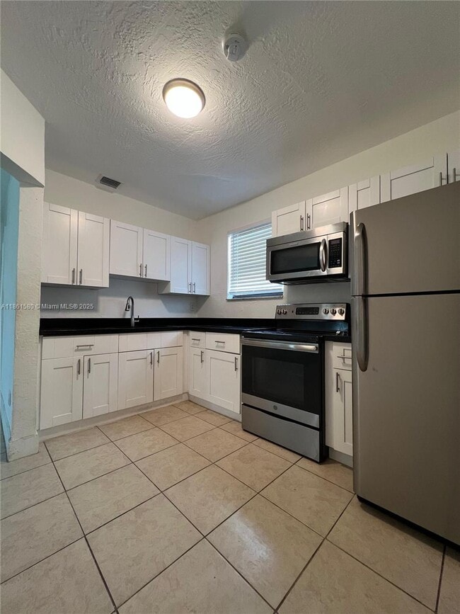 Building Photo - 1221 NW 23rd Terrace