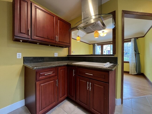 Building Photo - Classic Brick Portland Home on Stark Street with Dual Living Areas and Two Full Kitchens
