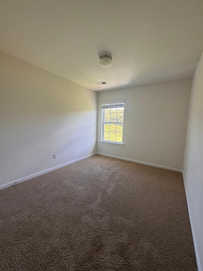 Building Photo - Modern 3-Bedroom Multiplex with 3 Full Bat...