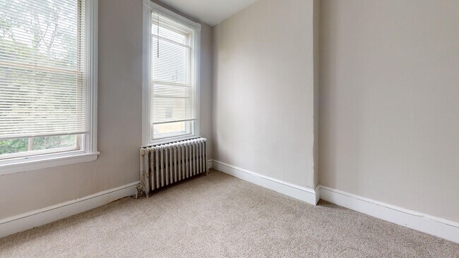 Building Photo - Three Bedroom Home Near Carroll Park