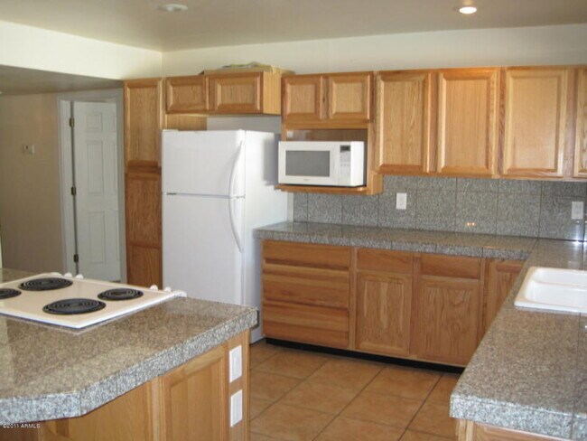 Building Photo - “Spacious 4-bedroom home with private pool in prime Tempe location!”