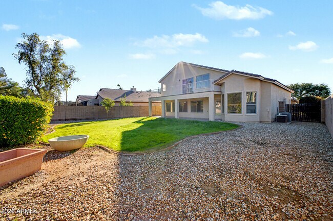 Building Photo - 7456 W Aurora Dr