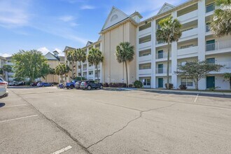 Building Photo - Highly Sought After GROUND-FLOOR Unit at Florida Club!  Pool View!!