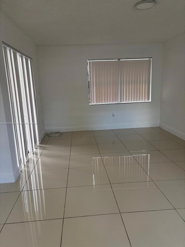 Building Photo - 10835 NW 7th St