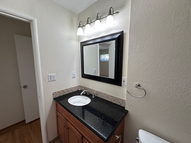 Building Photo - LARGE YARD, 3/2, Remodeled, AC, Cat Friend...