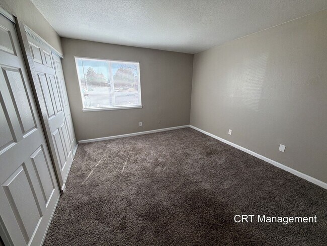 Building Photo - Spacious 3-Bedroom Condo with In-Unit Laundry – Convenient Aurora Location