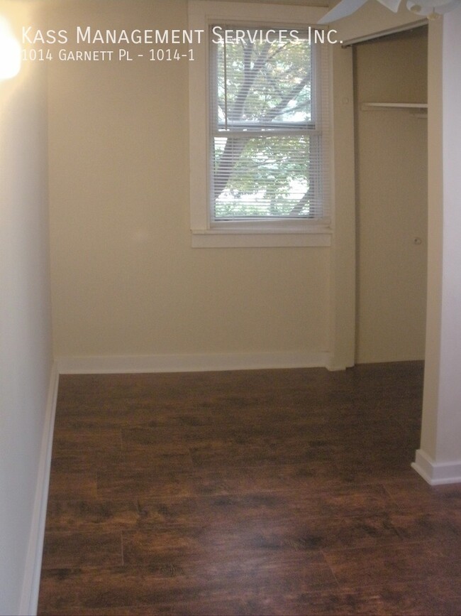 Building Photo - Very Spacious Duplex Apartment features 4 ...