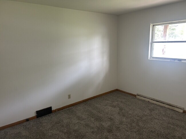 Building Photo - Three bedroom lower unit.