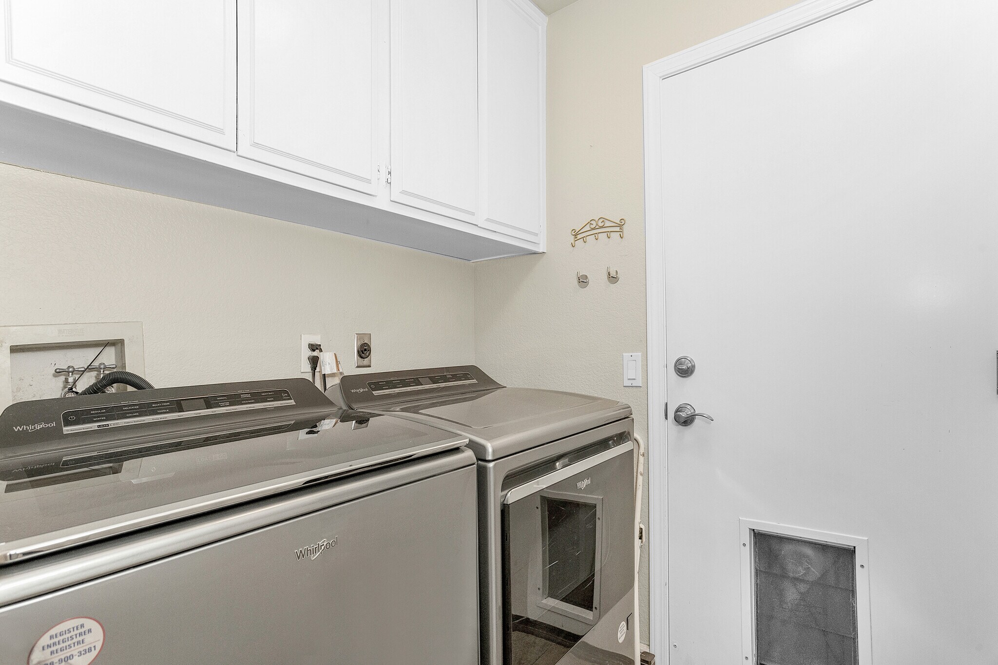 Inside laundry room, cabinetry and sink - 35 Inverary