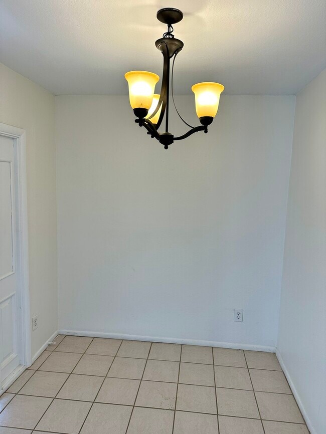 Building Photo - Nicely updated Marlette Estates home with pool, 3 beds, 2 baths. Features tile wood floors, firep...