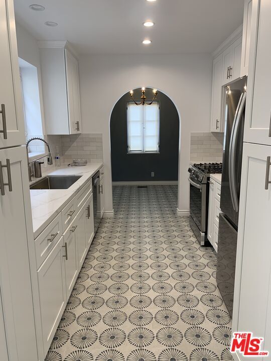 Building Photo - 8673 W Olympic Blvd