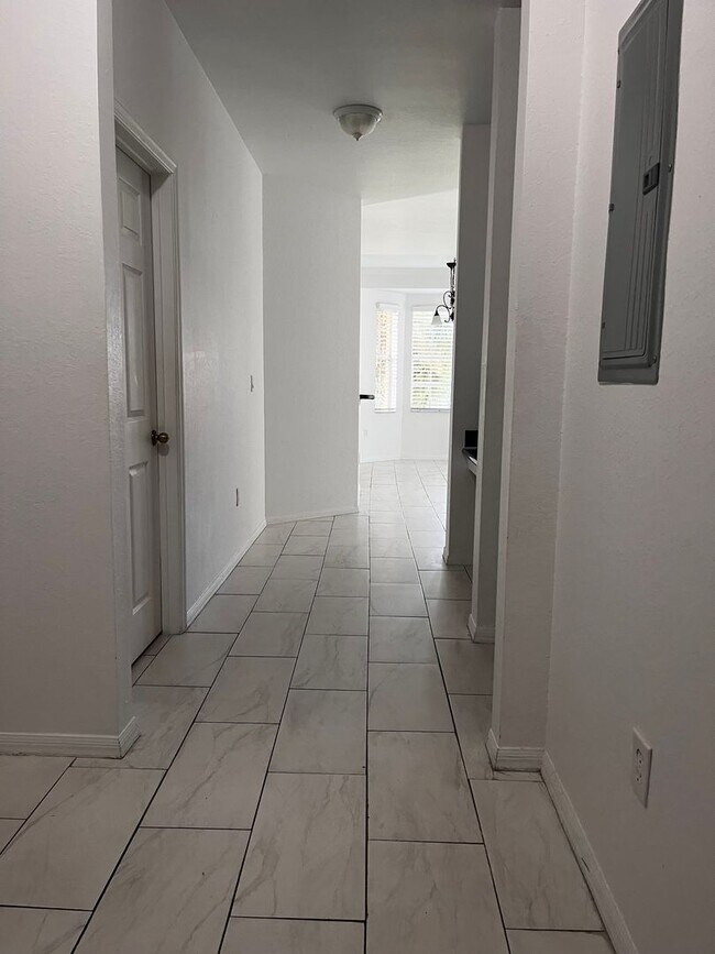 Building Photo - COMING SOON! Space, Style & Serenity! Enjoy comfortable living in this beautiful 4-bedroom home f...