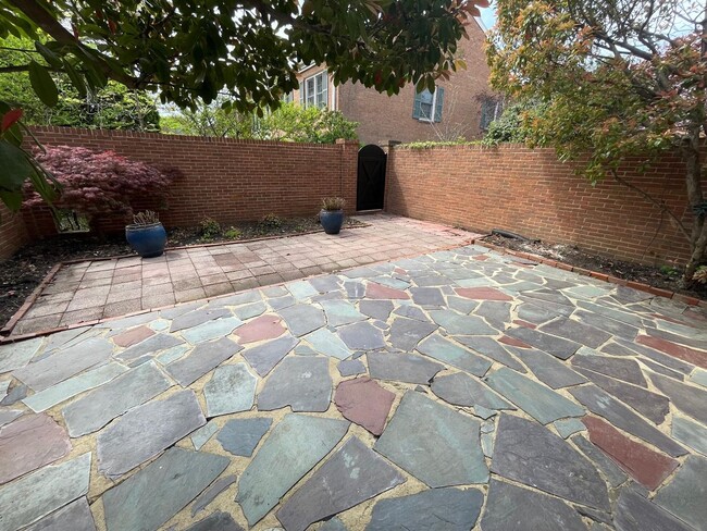 Building Photo - A fully updated Four Bedroom, Three and On...