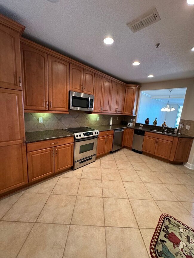 Building Photo - CONDO LOCATE IN GATED COMMUNITY  IN DR. PHILLIPS-TOSCANA - HALF OFF DECEMBER RENT