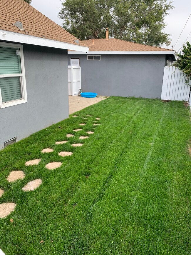Gated Back yard with storage access. - 428 Hamilton St