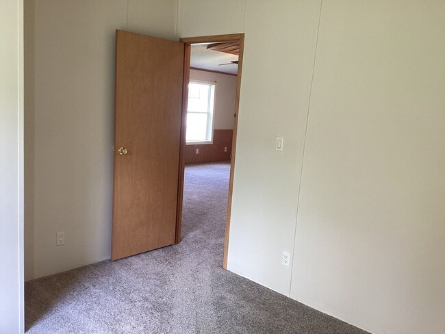 Building Photo - Three Bedroom House