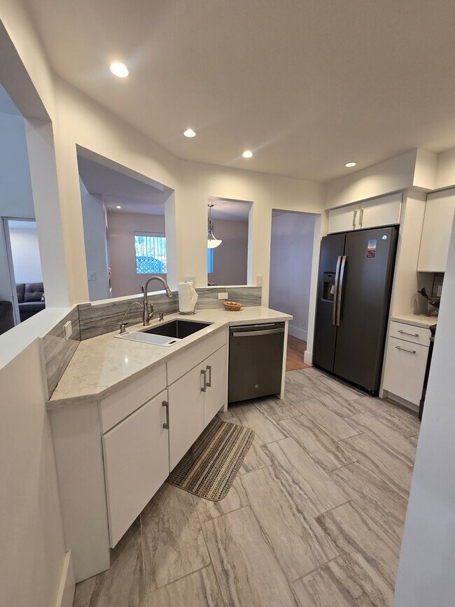 Building Photo - Furnished, 1-Year Long-Term Rental