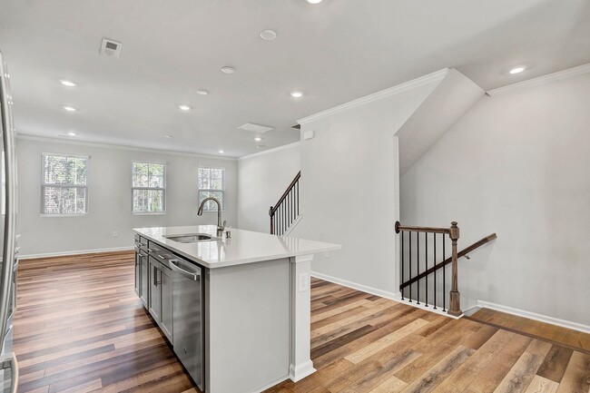 Building Photo - BRAND NEW BEAUTIFUL TOWNHOME IN GROWING AP...