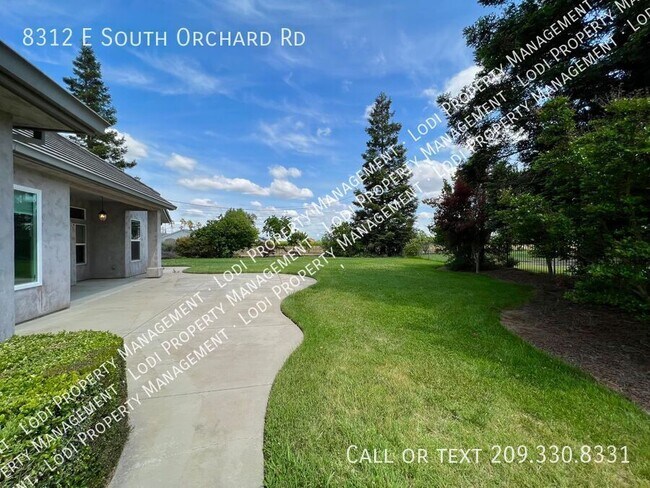 Building Photo - 8312 E Orchard Rd