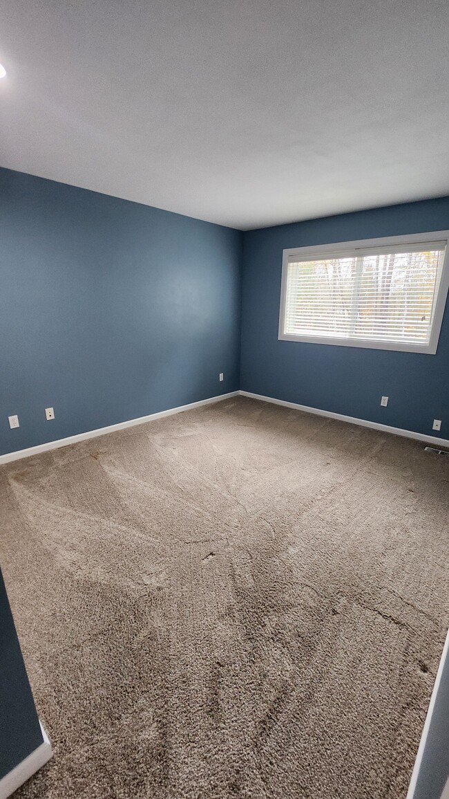 Bedroom 1 upstairs is quite large and has a view of the backyard - 7409 245th Way NE