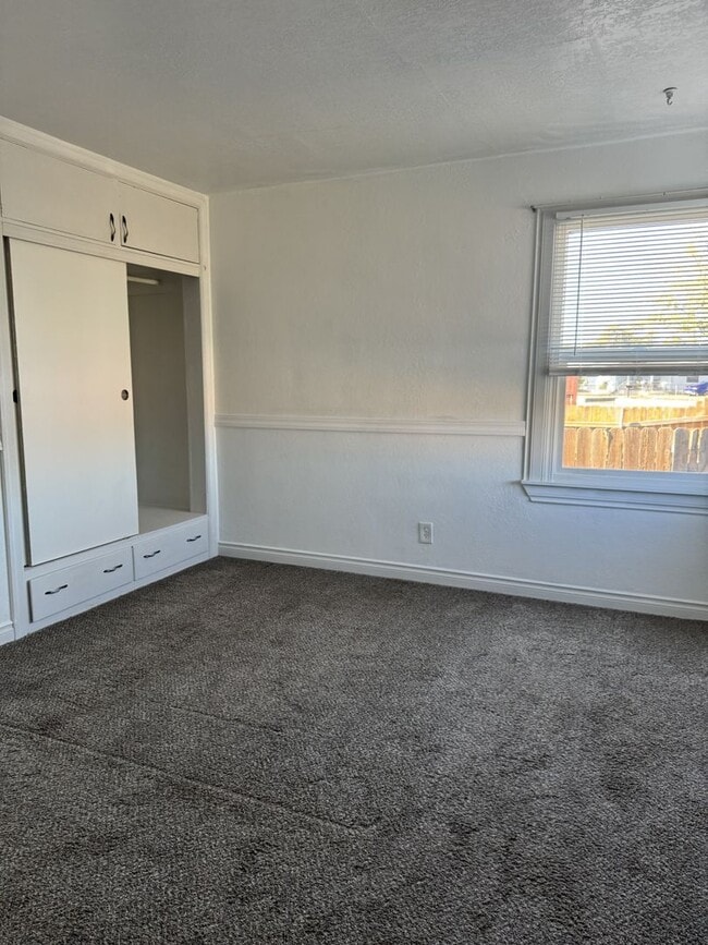 Building Photo - See the potential in this charming rental