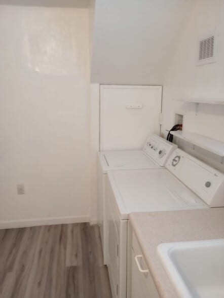 Laundry area with washer and dryer - 5655 W Ellsworth Ave