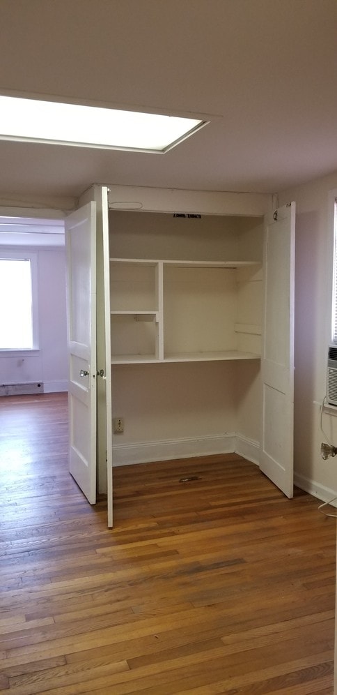 Bedroom w/ closet opened - 20 W Main St