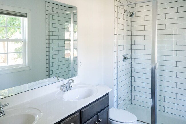 Building Photo - Like-new 3 bedroom, 2.5 bath house with an organic pond!