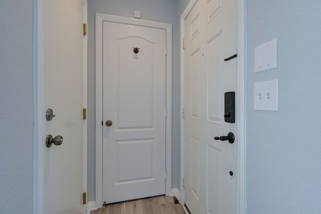 Building Photo - NW!! Gated!! Community Pool/Spa  Recreation Room!! New Paint!! New Flooring!!  Balcony!!  2 car g...