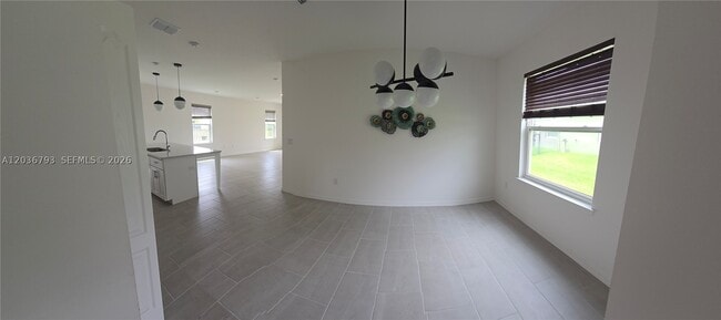 Building Photo - 10500 SW Vasari Way