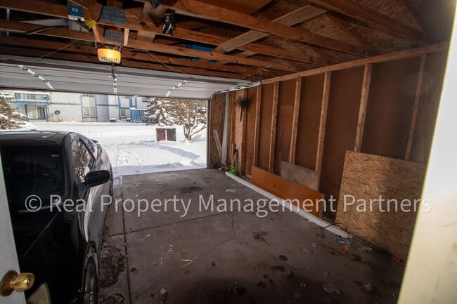 Building Photo - 2-Bed, 1-Bath Upper Unit with Garage & Porch – Steps from Paul Henry Trail