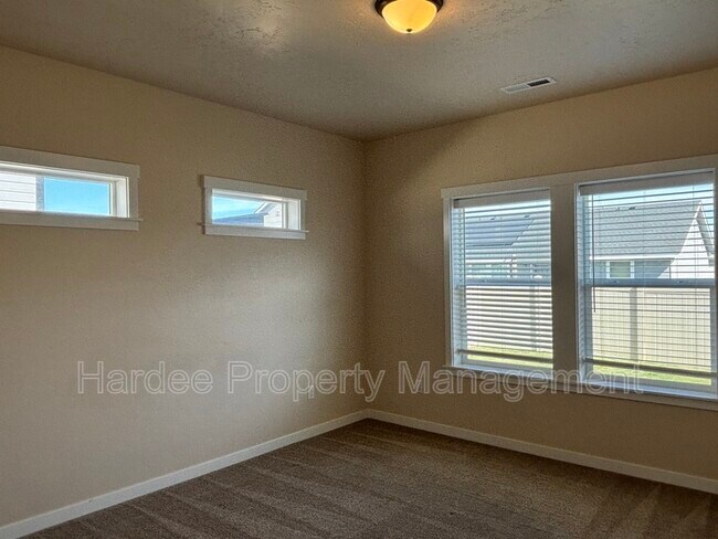Building Photo - 9070 W Songwood Dr